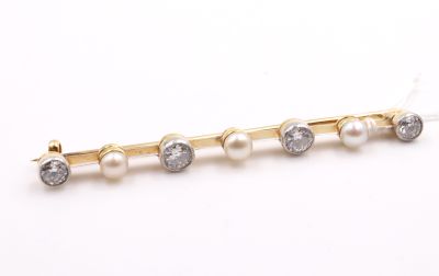 Broche barette or jaune sertie de 4 diamants ronds
