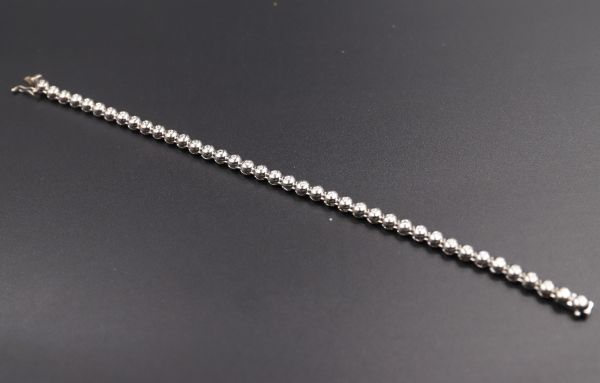 Bracelet or blanc et diamants