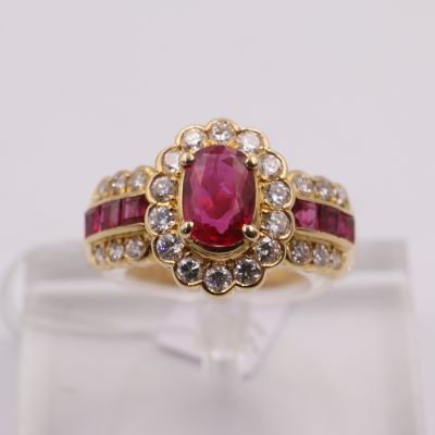 Important bague Marguerite rubis et diamants
