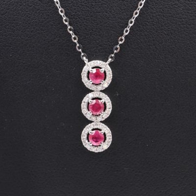 Pendentif Trilogie et sa chaînette en or blanc 18K