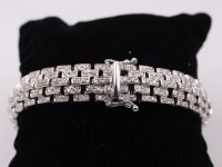 Bracelet or blanc et brillants